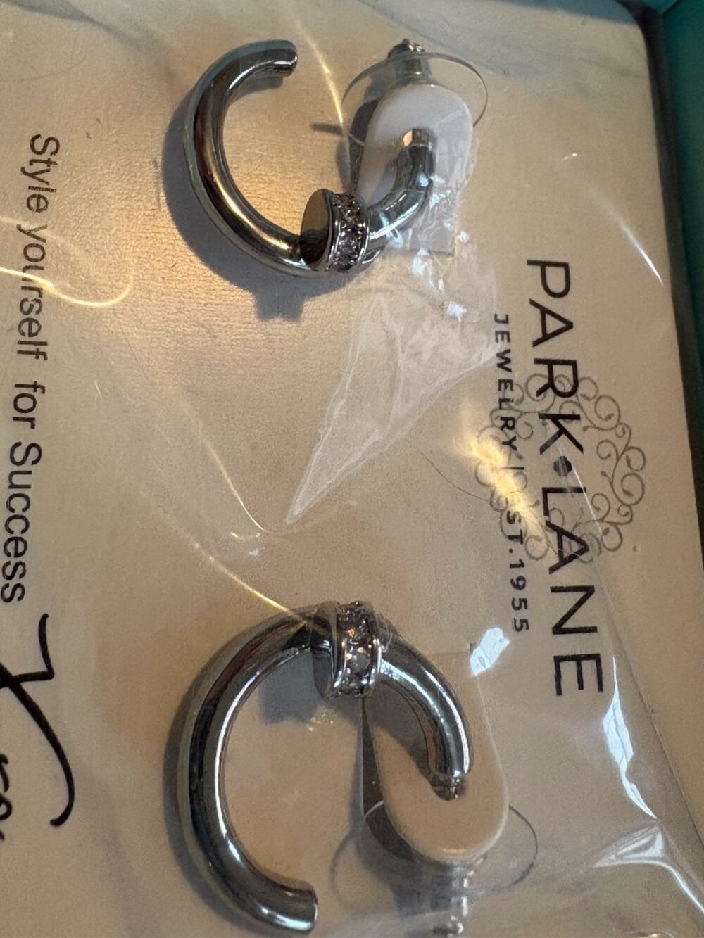 crest earrings silver